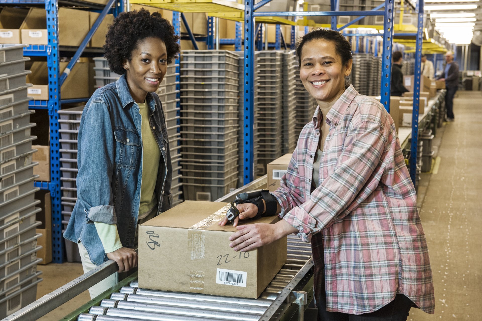 team-portrait-of-multi-ethnic-female-warehouse-wor-2023-11-27-04-52-53-utc