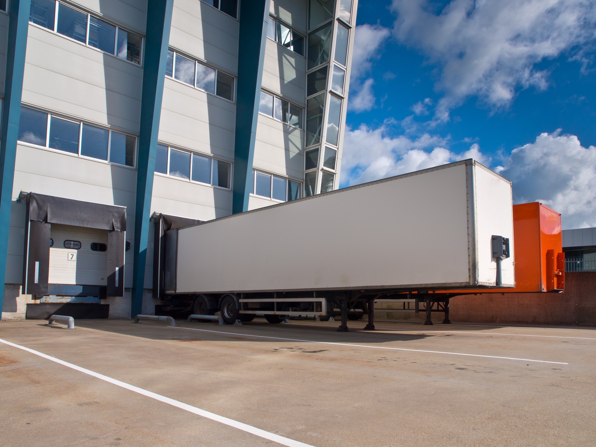 distribution-center-with-trailers-export-concept-2025-03-23-22-45-04-utc