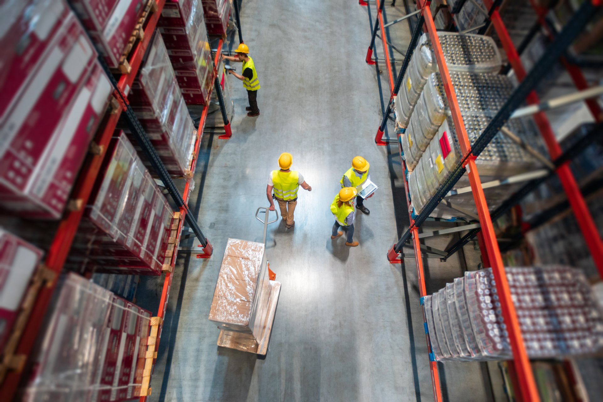 working-in-warehouse-group-of-workers-with-laptop-2026-01-05-23-13-44-utc