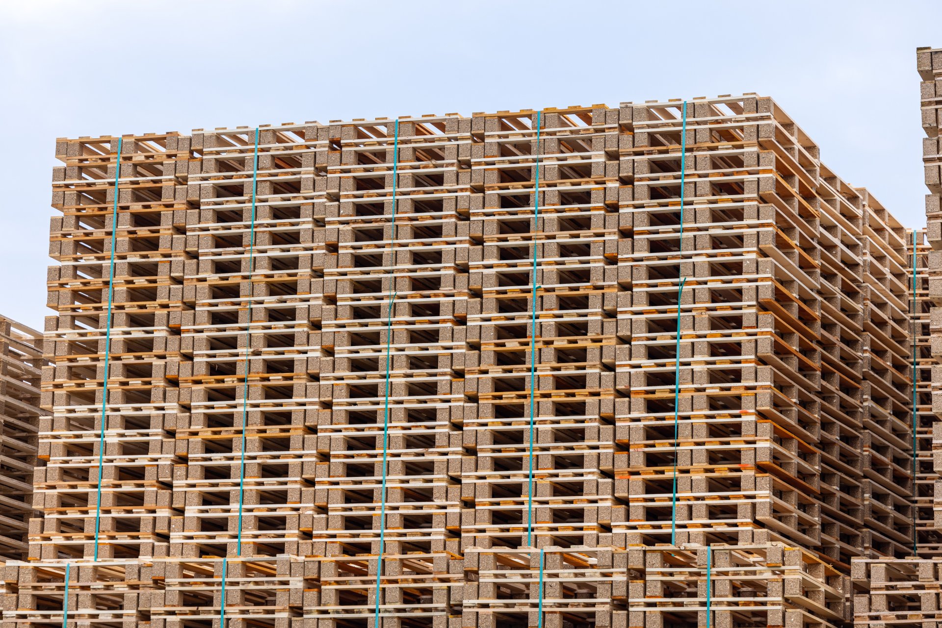 massive-stack-of-wooden-pallets-2025-02-11-23-45-15-utc-1